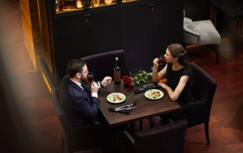 Couple enjoying a romantic dinner NYC experience at Andrew Steak Society