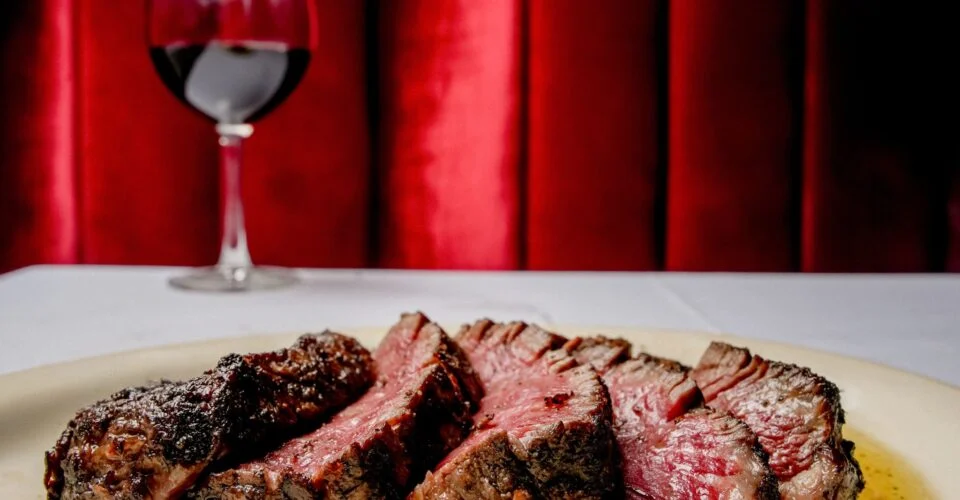 Wood-fired grill and dry-aged Tomahawk at Andrew Steak Society, one of the top steakhouses in Manhattan