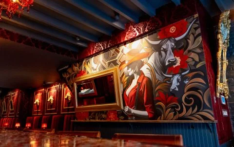 Cocktails and a dry-aged steak at the bar of Andrew Steak Society in the East Village, NYC