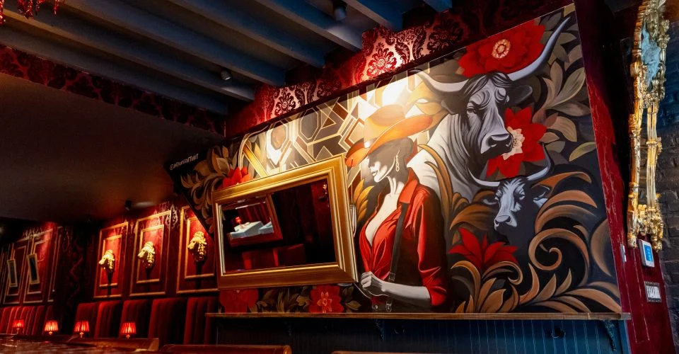 Cocktails and a dry-aged steak at the bar of Andrew Steak Society in the East Village, NYC